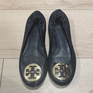 Tory Burch Black Flats with Gold Emblem 8